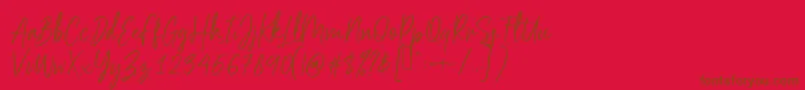 Scriptyca Font – Brown Fonts on Red Background