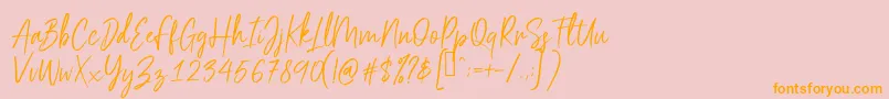 Scriptyca Font – Orange Fonts on Pink Background
