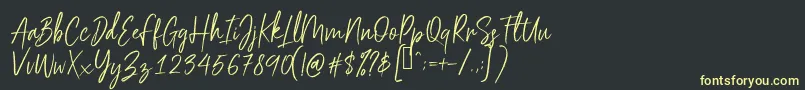 Scriptyca Font – Yellow Fonts on Black Background