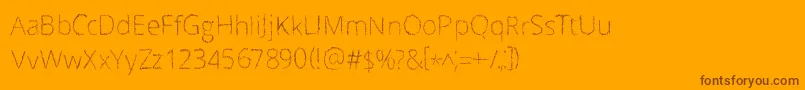 Scrizbels Font – Brown Fonts on Orange Background