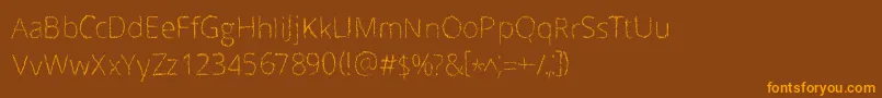 Scrizbels Font – Orange Fonts on Brown Background