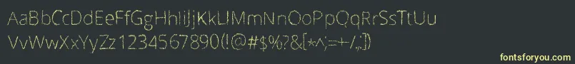 フォントScrizbels – 黒い背景に黄色の文字