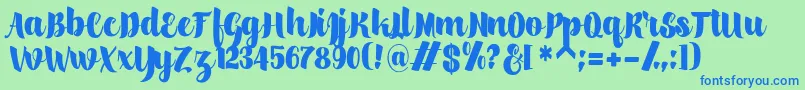 scylla-Schriftart – Blaue Schriften auf grünem Hintergrund