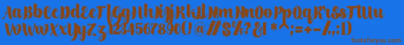 scylla-Schriftart – Braune Schriften auf blauem Hintergrund