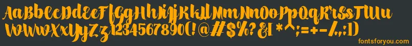 scylla Font – Orange Fonts on Black Background