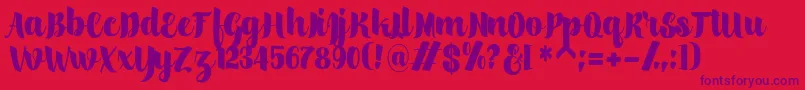 scylla-Schriftart – Violette Schriften auf rotem Hintergrund