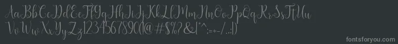 フォントseabright – 黒い背景に灰色の文字