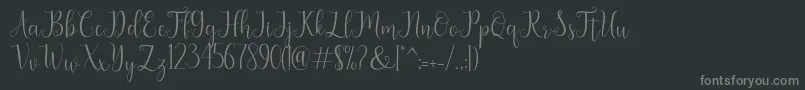 フォントseabright – 黒い背景に灰色の文字