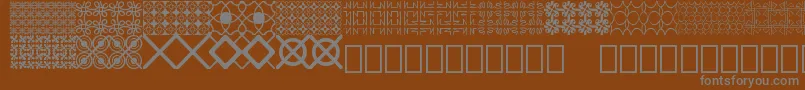 Seamless patterns Demo-Schriftart – Graue Schriften auf braunem Hintergrund