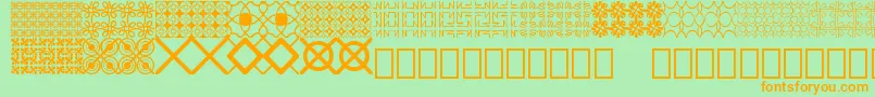 Seamless patterns Demo-Schriftart – Orangefarbene Schriften auf grünem Hintergrund