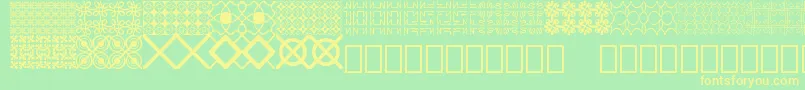 Шрифт Seamless patterns Demo – жёлтые шрифты на зелёном фоне