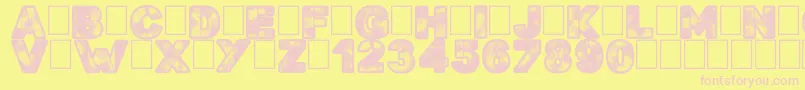 Searchn Destroy-fontti – vaaleanpunaiset fontit keltaisella taustalla