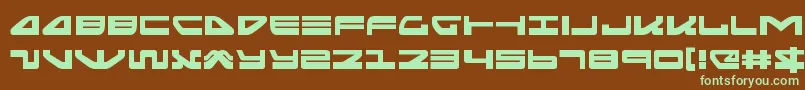 フォントseariderfalconexpand – 緑色の文字が茶色の背景にあります。