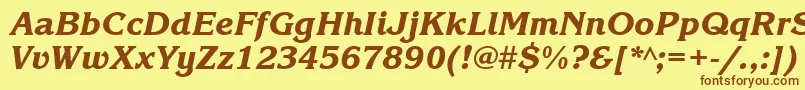 Czcionka KorinnablackgttItalic – brązowe czcionki na żółtym tle