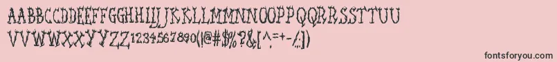 フォントSEAWFA   – ピンクの背景に黒い文字