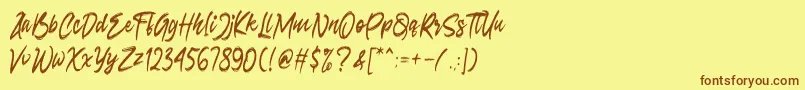 フォントSeconds – 茶色の文字が黄色の背景にあります。