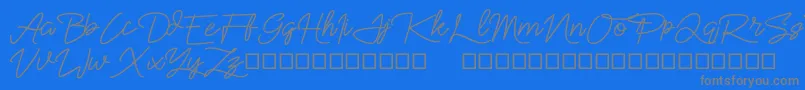 Sekaran-Schriftart – Graue Schriften auf blauem Hintergrund