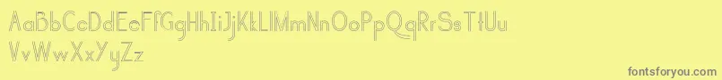 selari regular-Schriftart – Graue Schriften auf gelbem Hintergrund