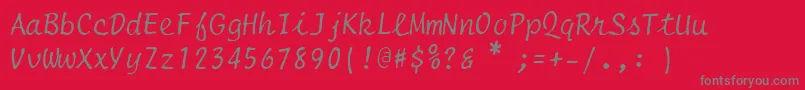 フォントSelectric Script – 赤い背景に灰色の文字