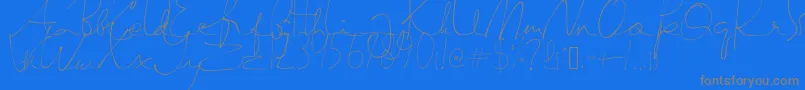 Fonte SemayaneHandwriting – fontes cinzas em um fundo azul