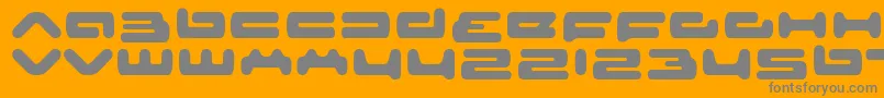 senior service-fontti – harmaat kirjasimet oranssilla taustalla
