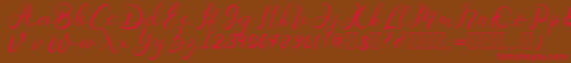 フォントSenoritta – 赤い文字が茶色の背景にあります。