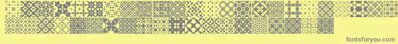 Fonte SlTiler1 – fontes cinzas em um fundo amarelo