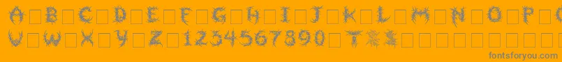 Sepulcra-Schriftart – Graue Schriften auf orangefarbenem Hintergrund