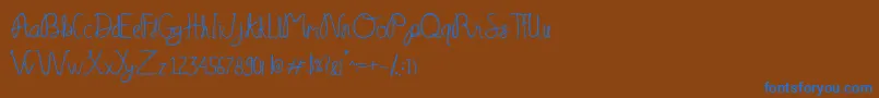 Serelo manisse Font – Blue Fonts on Brown Background