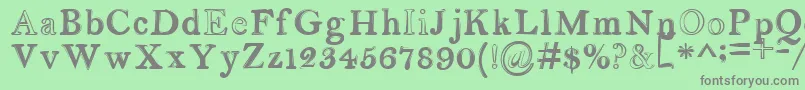 フォントserendipity – 緑の背景に灰色の文字