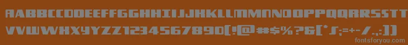 フォントTyphoonexpand – 茶色の背景に灰色の文字