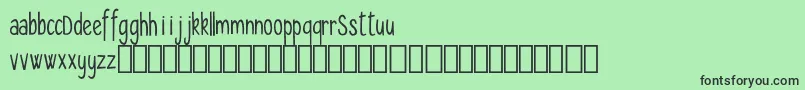 フォントSeryfan Demo – 緑の背景に黒い文字