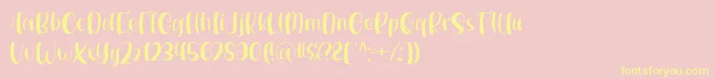 Seshila by 7NTypes D Font – Yellow Fonts on Pink Background
