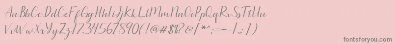 フォントSeullanga script – ピンクの背景に灰色の文字