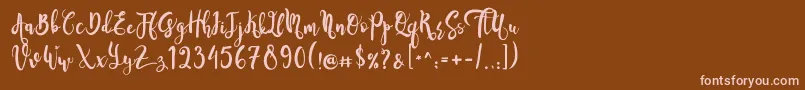 SeventeenDemo-fontti – vaaleanpunaiset fontit ruskealla taustalla