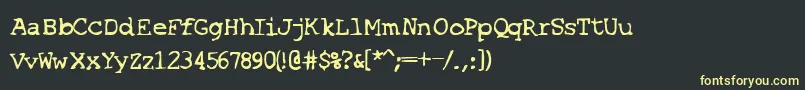 フォントSF Espionage Medium – 黒い背景に黄色の文字