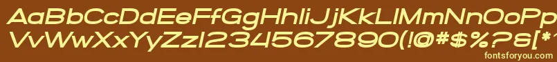 SF Grandezza Heavy Oblique-fontti – keltaiset fontit ruskealla taustalla