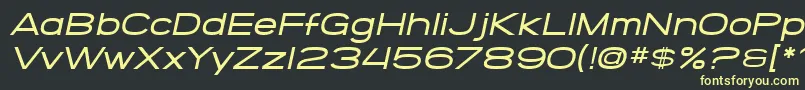 SF Grandezza Medium Oblique-Schriftart – Gelbe Schriften auf schwarzem Hintergrund