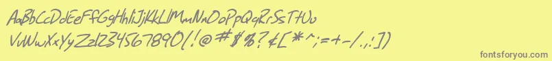 フォントSF Grunge Sans Italic – 黄色の背景に灰色の文字