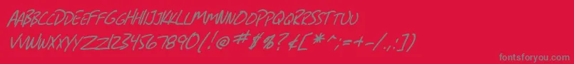 Czcionka SF Grunge Sans SC Italic – szare czcionki na czerwonym tle