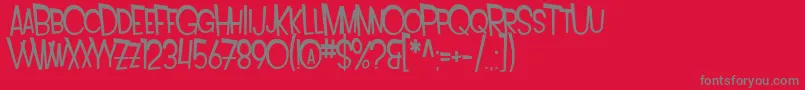 フォントSF Intoxicated Blues Extended – 赤い背景に灰色の文字