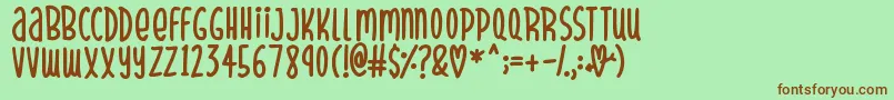 SparklyHearts Font – Brown Fonts on Green Background