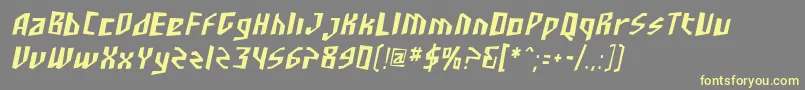 Шрифт SF Junk Culture Condensed Oblique – жёлтые шрифты на сером фоне