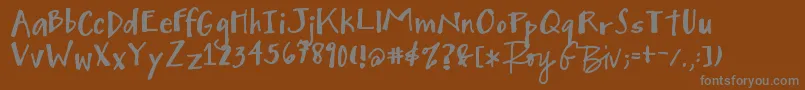 フォントMightyToSave – 茶色の背景に灰色の文字