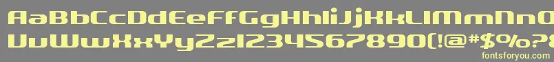 Шрифт SF Quartzite Extended – жёлтые шрифты на сером фоне