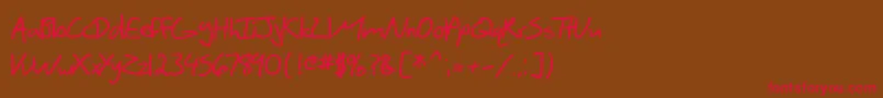 フォントSF Scribbled Sans Bold – 赤い文字が茶色の背景にあります。