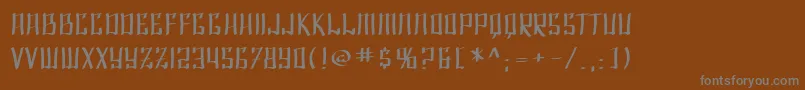 フォントSF Shai Fontai Extended – 茶色の背景に灰色の文字