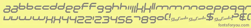 SF Technodelight NS Italic-fontti – harmaat kirjasimet keltaisella taustalla