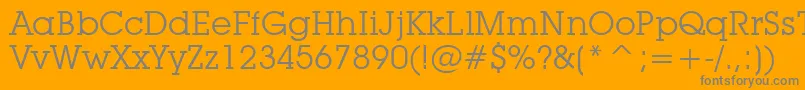 LubalinGraphBookBt-fontti – harmaat kirjasimet oranssilla taustalla