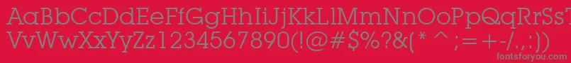 LubalinGraphBookBt-Schriftart – Graue Schriften auf rotem Hintergrund